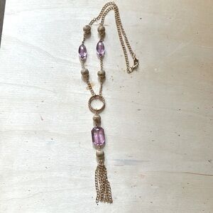 Gold color fashion necklace.